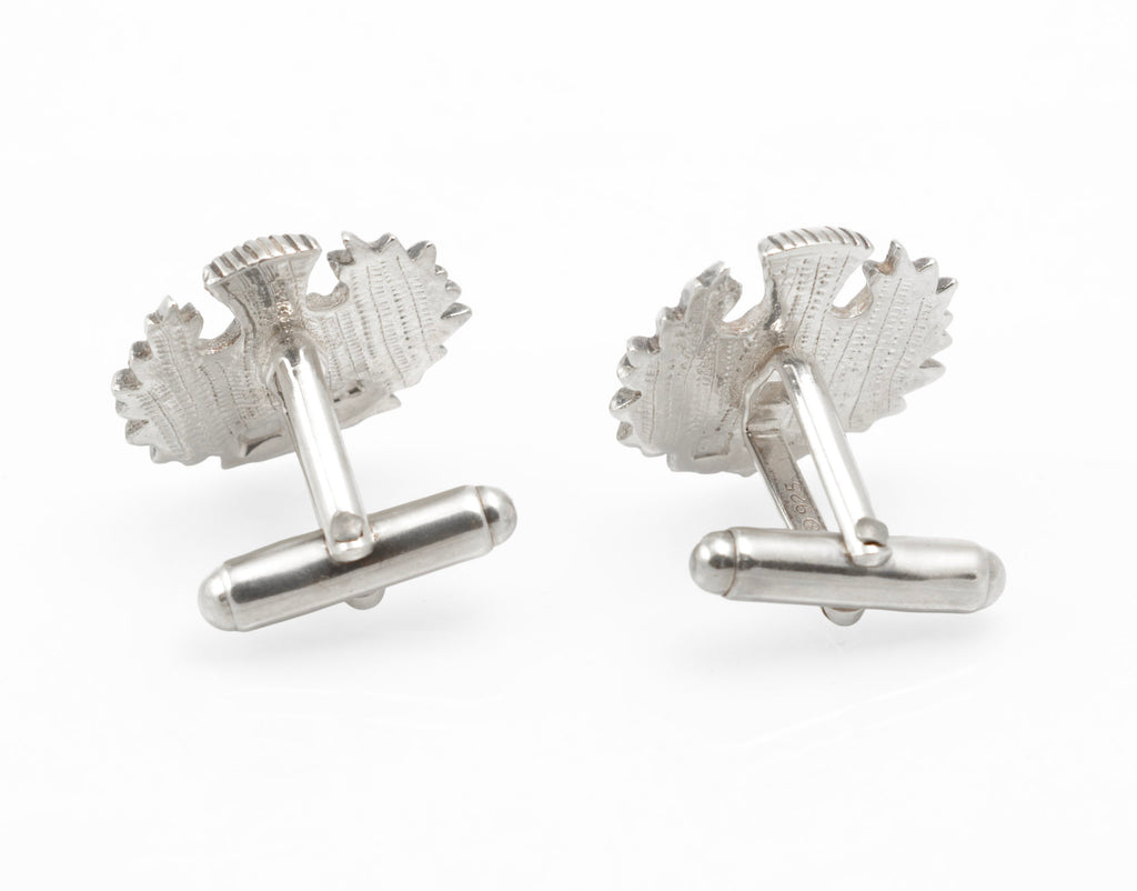 Reverse of both cufflinks showing the toggle bars and chain fittings