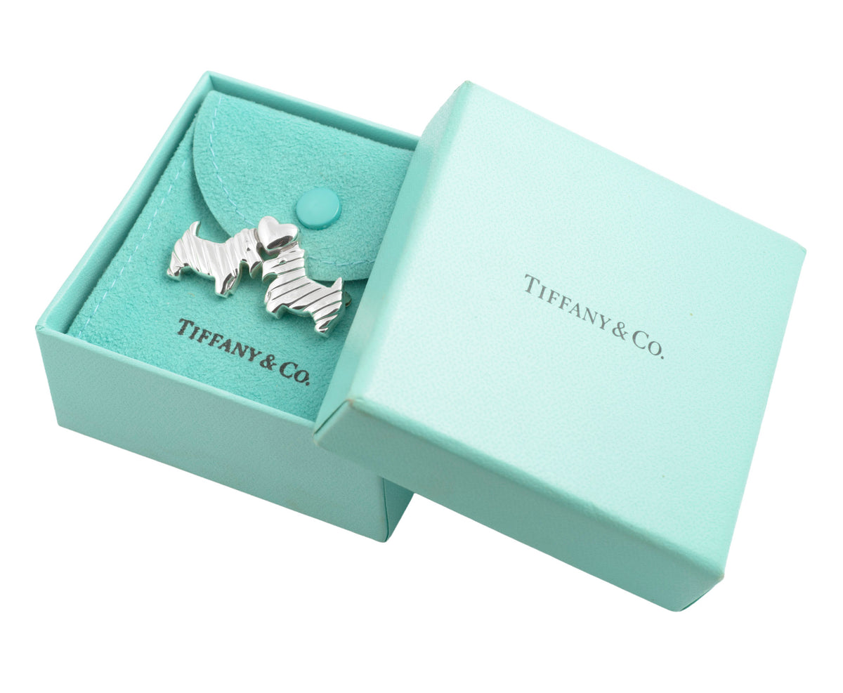 Silver Scottie dog brooch with Tiffany pouch inside its open presentation box