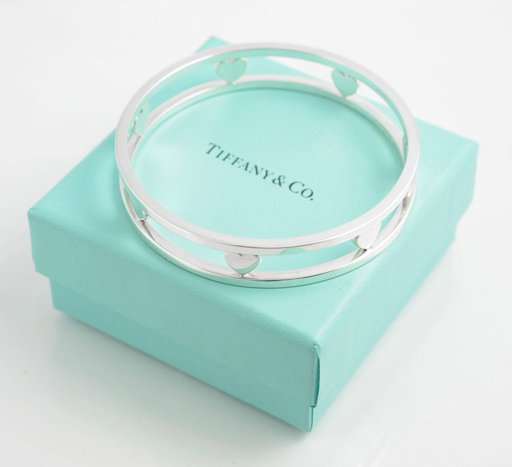 View from above of Tiffany double rail heart bangle on its box