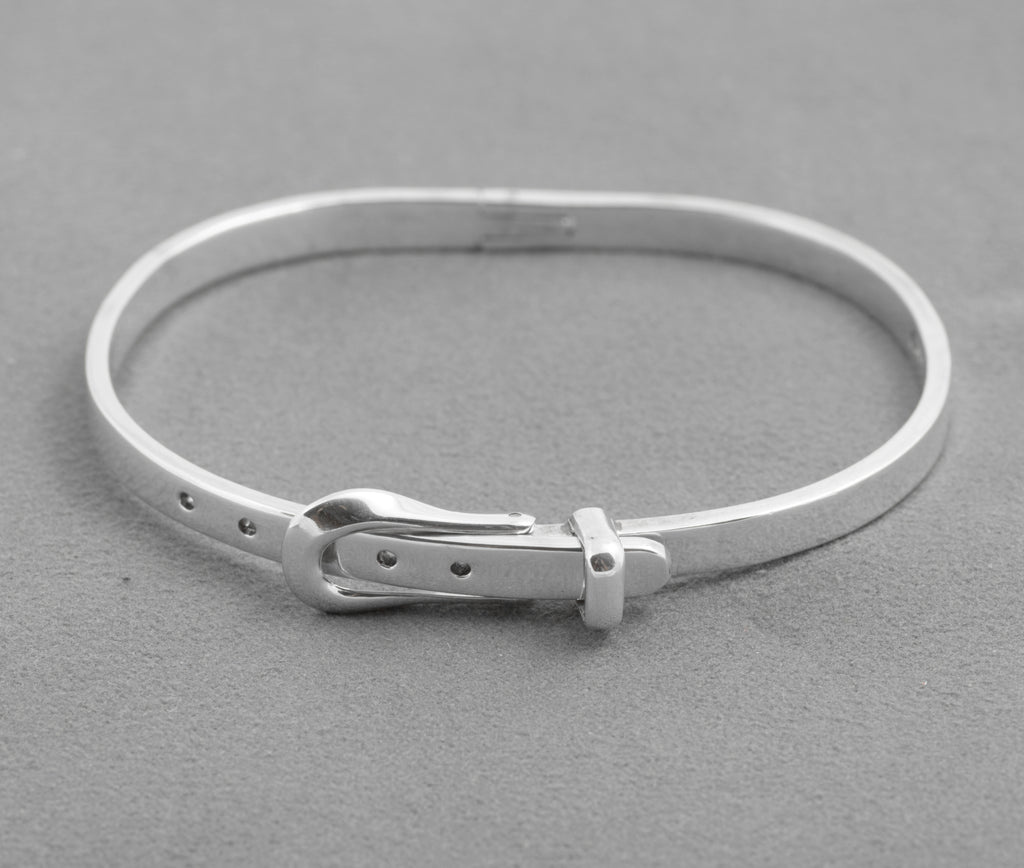 Front view of Mexican silver adjustable bangle showing buckle and adjustment holes