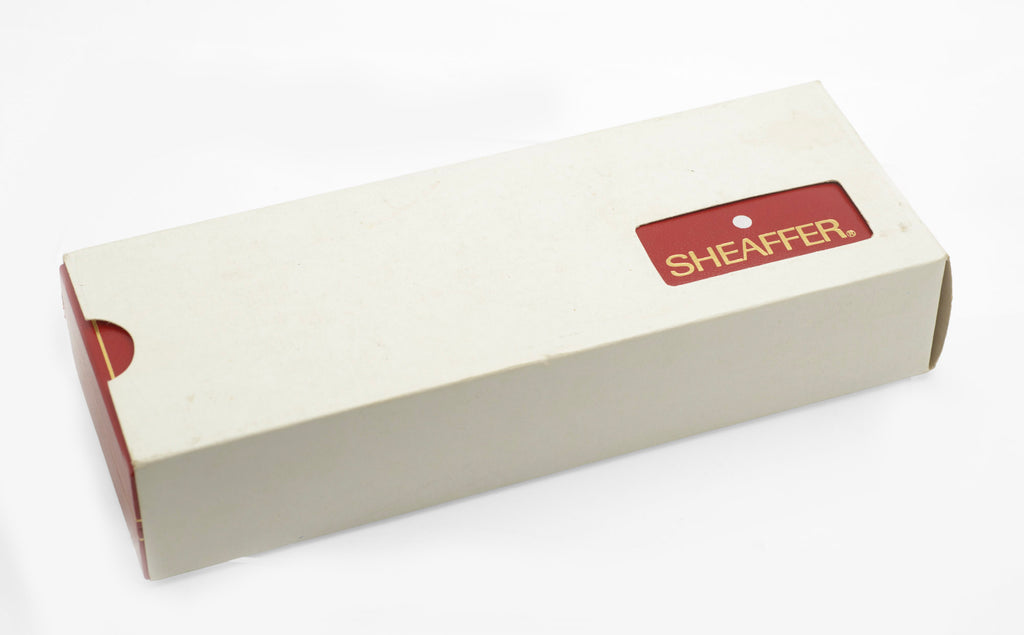 Original Sheaffer outer card slip around the red presentation case