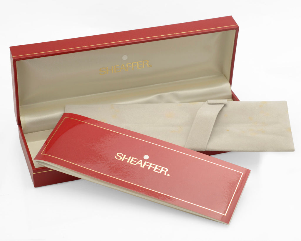 Open Sheaffer presentation case with cream interior, booklet and packaging