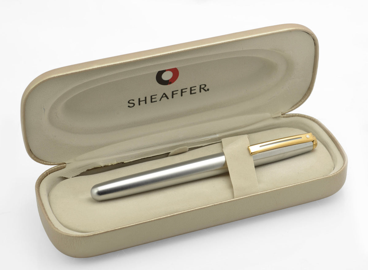 Sheaffer Prelude brushed chrome fountain pen inside its open case, showing split hinge lining