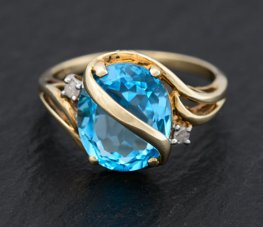 Baby Swiss Blue Topaz Gemstone Ring In 9ct Gold With Wrap Over Mount (A1463)